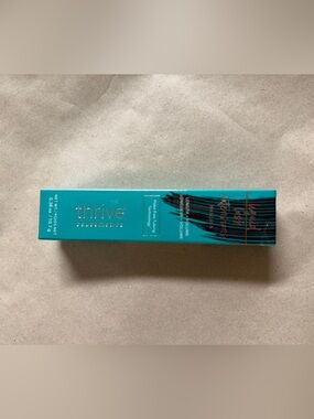 Thrive Causemetics Mascara in Teal Packaging with Black Accent